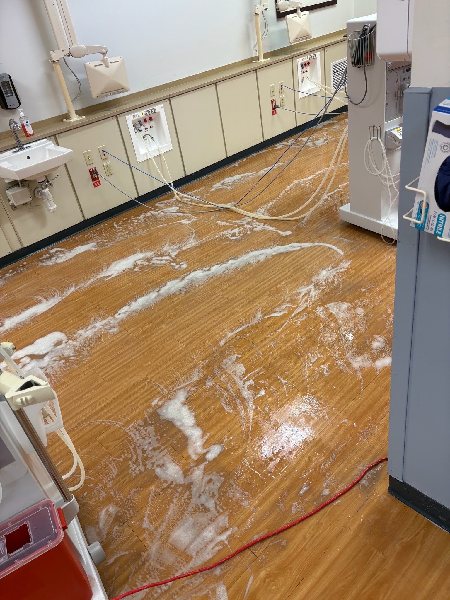 Dialysis treatment floor being machine-scrubbed
